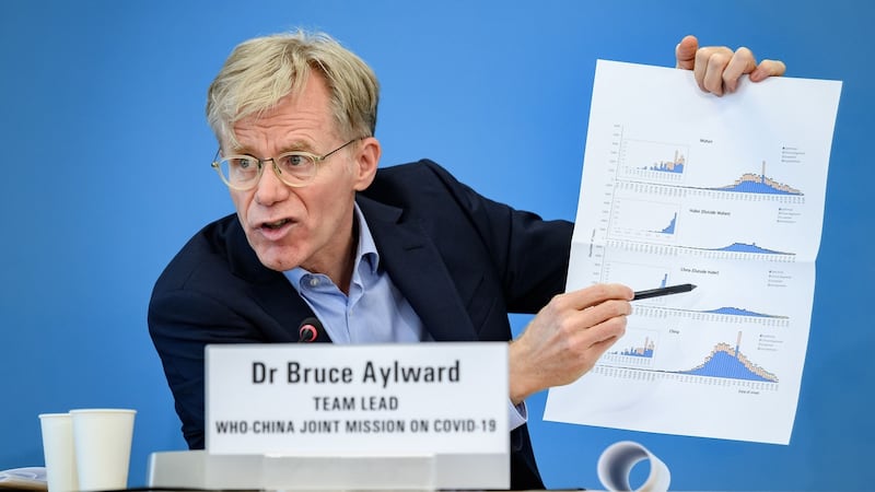 Team leader of the joint mission between the World Health Organisation (WHO) and China on covid-19, Bruce Aylward shows graphics during a press conference in Geneva on February 25th, 2020. Photograph: Fabrice Coffrini/AFP/Getty Images.