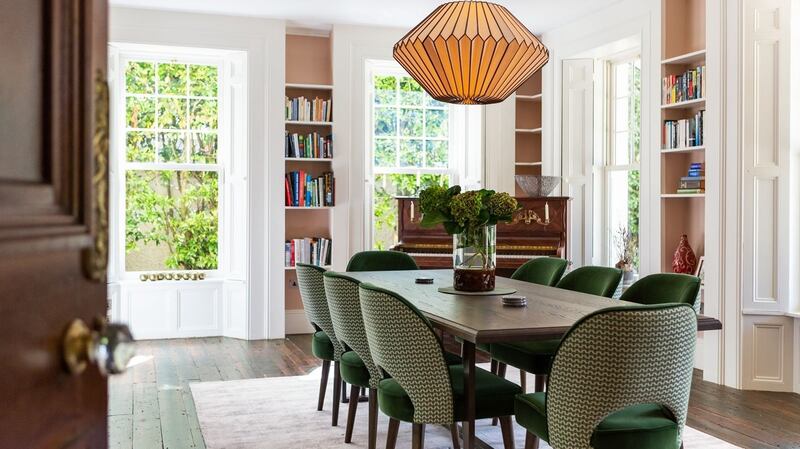 Dining room: Well-upholstered velvet chairs are at the centre of this dual aspect room