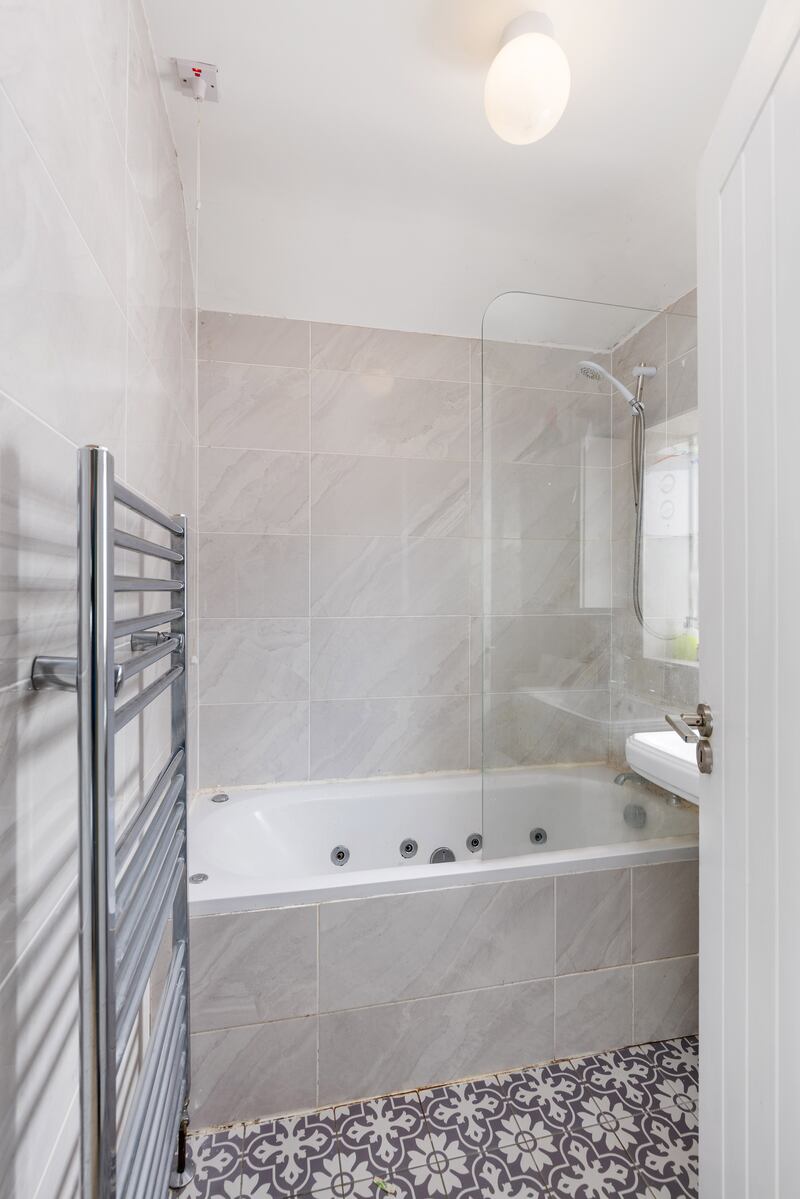 The family bathroom has a Jacuzzi bath