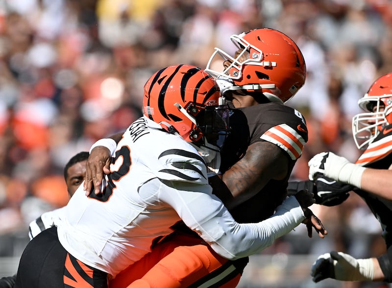 Deshaun Watson of the Cleveland Browns is hit by Joseph Ossai of the Cincinnati Bengals during the game at Huntington Bank Field. Photograph: Nick Cammett/Getty Images