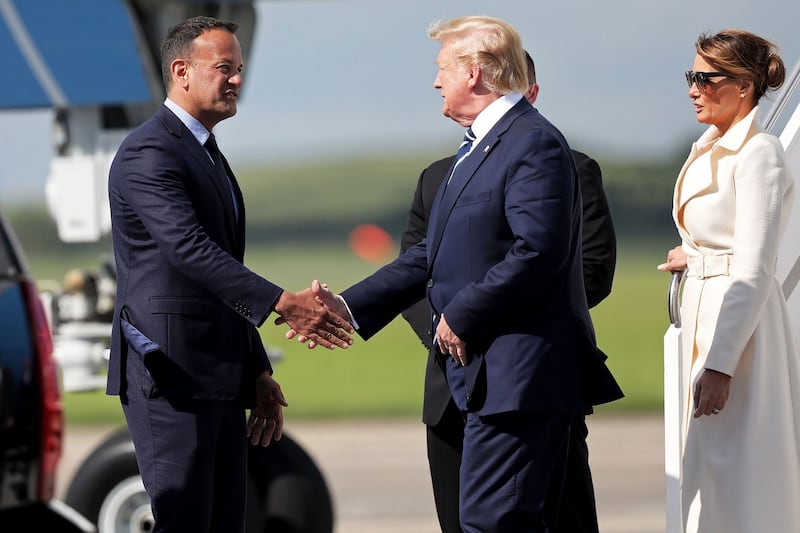 Donald Trump greeted by Taoiseach Leo Varadkar upon disembarking Air Force One upon arrival at Shannon Airport on a previous trip. Photograph: Government handout/AFP/Getty Images