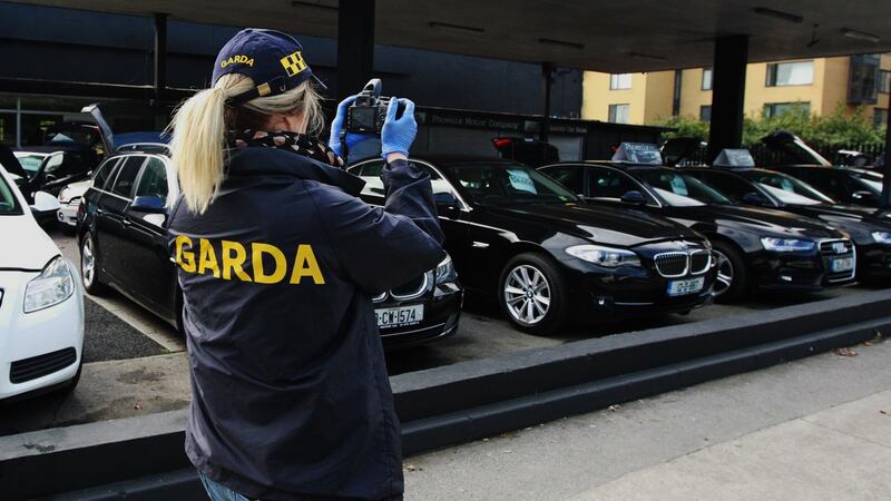 About 20 premises in Dublin - including private homes and commercial properties  connected with the motor trade - were searched by gardaí during an  operation against organised crime on Tuesday. Photograph: Padraig O’Reilly.