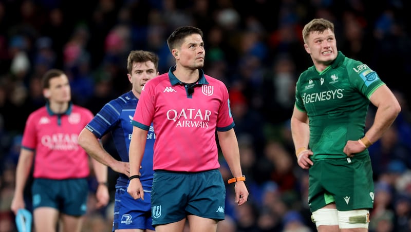 Referee Chris Busby with Leinster's Luke McGrath and Connacht's Cian Prendergast. His failure to make the cut for the Six Nations is a real disappointment for him and for the IRFU. Photograph: James Crombie/Inpho 