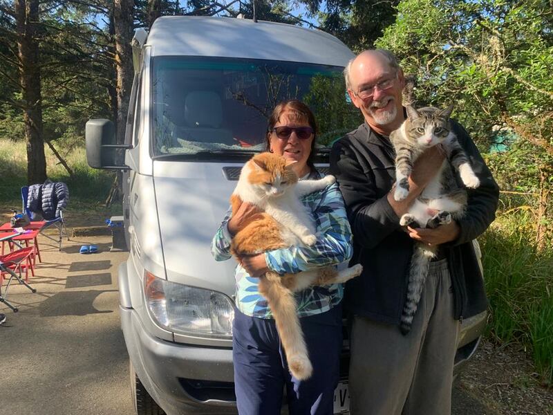 Cindy and Will and their adventurous cats, Jasper and Trixy.