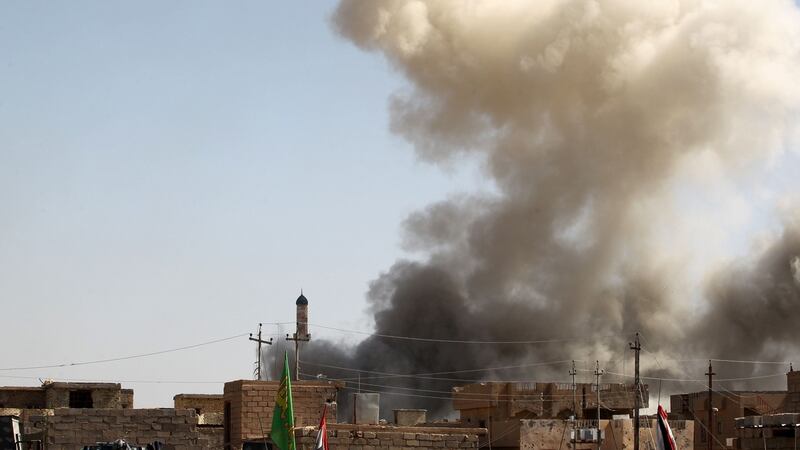 Smoke billows during an operation by Iraqi government forces, backed by air support from the US-led coalition, in Falluja’s southern Shuhada neighbourhood to retake the area from the Islamic State  group on June 15th, 2016. Photograph: Ahmad Al-Rubaye/AFP/Getty Images