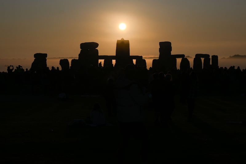 The sun rises at Stonehenge. Photograph: Daniel Leal/AFP via Getty