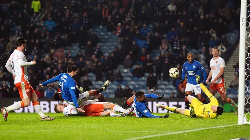 Rangers' Robin Propper sees his shot saved by Dundee United goalkeeper Jack Walton during the William Hill Premiership match at Ibrox Stadium, Glasgow. Picture date: Saturday November 23, 2024. PA Photo. See PA story SOCCER Rangers. Photo credit should read: Andrew Milligan/PA Wire.

RESTRICTIONS: Use subject to restrictions. Editorial use only, no commercial use without prior consent from rights holder.