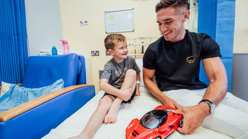 Love Island winner Greg O Shea meets  Dion Quigley (6) during a visit to the  Children’s Ark in University Hospital Limerick  on Wednesday. Photograph:   Brian Arthur