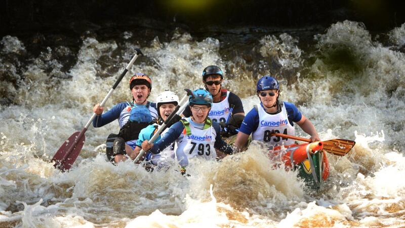 David Doyle, Fred Reed and Matthew White (left) with Mark Gregan and Laurence McDonnell, taking part in the Canoeing Ireland Liffey Descent at Straffan in Co Kildare. Photograph: Dara Mac Dónaill