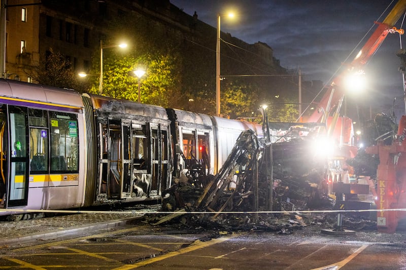 A view burnt out bus and Luas on O'Connell Street. Photograph: Tom Honan / The Irish Times