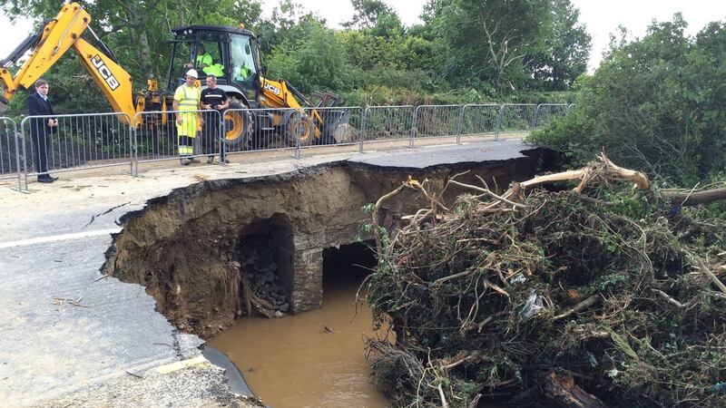 Damage to the main Derry to Moville road in Co Donegal caused by the force of a flooded river overnight. Photograph: Brian Hutton/PA Wire