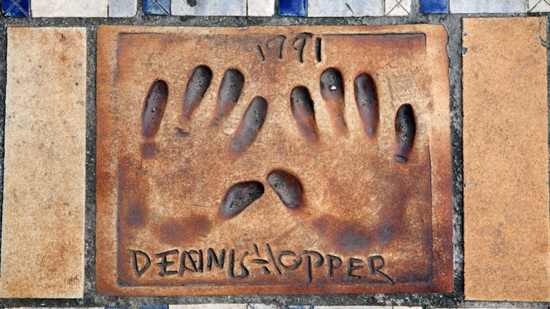 Handprints of cinema stars on the street in Cannes. Photograph: Rebecca Marshall/New York Times