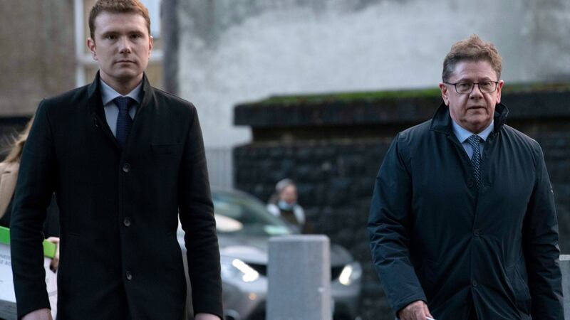 John Sweeney  (right) and his son James Sweeney arriving at court in Co Galway to attend a hearing where they’re two of four people accused to have breached Covid restrictions by organising a golf society dinner. Photograph: Andrew Downes/PA Wire