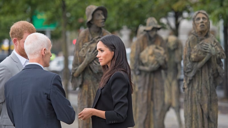 Meghan Markle visiting the  Famine Memorial on the bank of the River Liffey. Photograph: Zak Hussein/Getty Images)