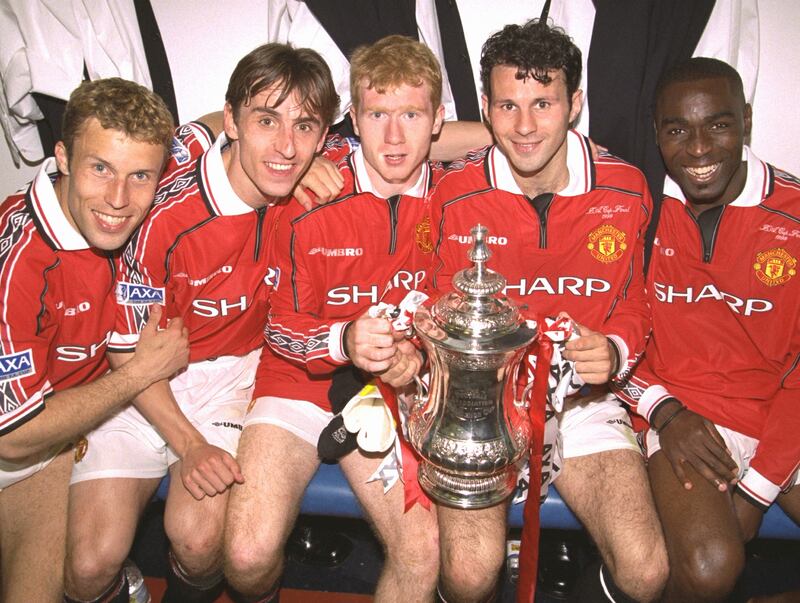 Manchester United's Ronny Johnson, Gary Neville, Paul Scholes, Ryan Giggs and Andy Cole celebrate after their FA Cup final victory against Newcastle at Wembley Stadium on May 22nd, 1999 in London. Photograph: John Peters/Manchester United via Getty Images