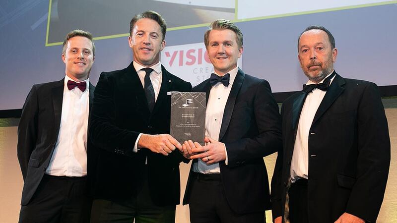 Aaron O'Grady, Managing Director, Vision Creative Studios presents the Excellence in Collaboration award to Dara Murphy, Paul Finnegan, MOLA Architecture & Chris Bakkala, Bakkala Consulting Engineering.