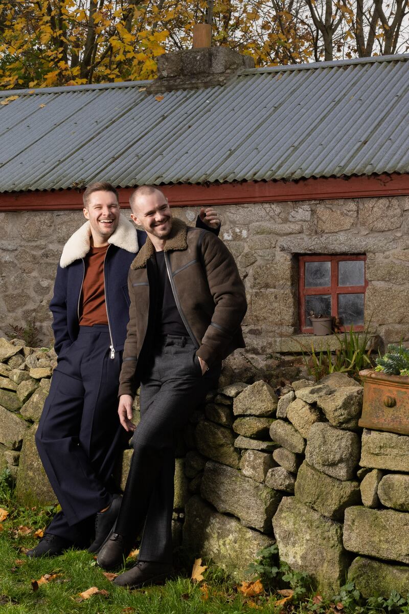 Jack Reynor wears: navy jacket, Ami Paris at Brown Thomas, €980; rust T-shirt, Tommy Hilfiger at Best Menswear, €39.90; navy trousers, Ami Paris at Brown Thomas, €580; shoes, Timberland at Jervis Shopping Centre, €165. Sam Keeley wears: grey shearling jacket, Paul Smith at Zalando, €1,635; black T-shirt, Selected at Jervis Shopping Centre, €24.99; trousers, Prada at Brown Thomas, €1450; shoes, Sam’s own. Photograph: Emily Quinn