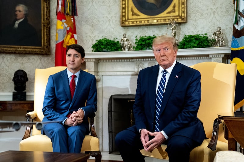 Justin Trudeau with president Donald Trump at the Oval Office of the White House in Washington in 2019. For a while, Trudeau seemed to offer a stark contrast to Trump's policies on areas like immigration. Photograph: Erin Schaff/The New York Times)
                      