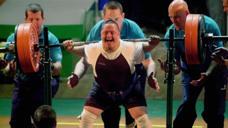 Robert Hill from the USA finds the strength in the squat lift competition at the  RDS