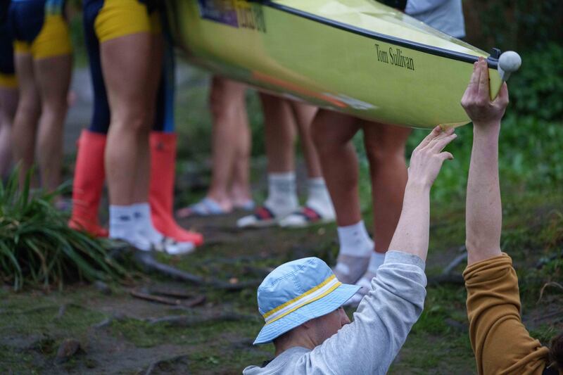 One of the novice Trinity teams moving their boat from a weir on the river Liffey to make their way down to the start line some 4km away. Photograph: Barry Cronin