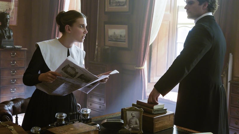 Millie Bobby Brown and Henry Cavill in Enola Holmes. Photograph: Alex Bailey/Netflix