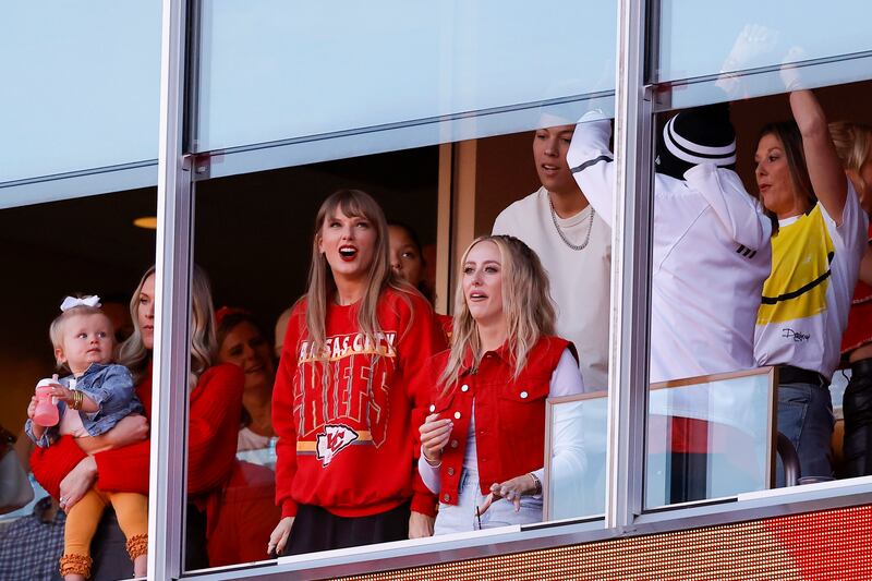 Taylor Swift reacts to a touchdown scored by Travis Kelce during Kansas City Chiefs' game against the Los Angeles Chargers in Kansas City in October. Photograph: David Eulitt/Getty Images