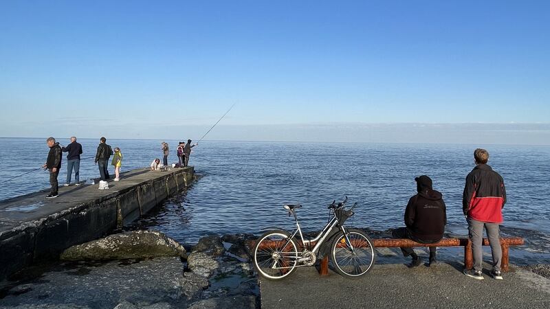 Locals in Odesa spend an afternoon by the Black Sea, despite air-raid sirens and the sound of explosions from Russian missile strikes on the city’s airport. Photograph: Daniel McLaughlin