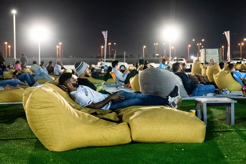 Soft-side lounge chairs and couches allow fans to watch games on large screens. Photograph: Erin Schaff/The New York Times