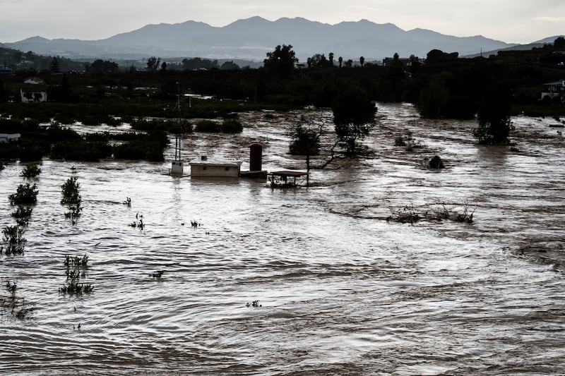 A view of the rising river in Alora, Malaga. Photograph:  Gregorio Marrero/AP