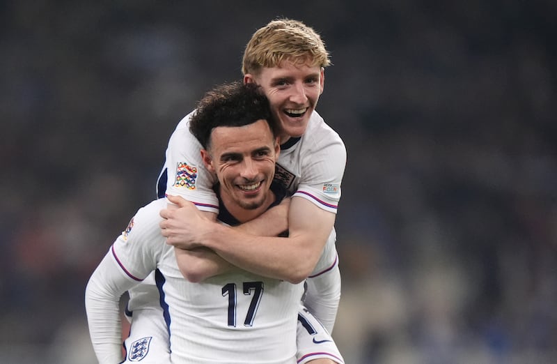 England's Curtis Jones (left) and Anthony Gordon celebrate the 0-3 win over Greece on Thursday night in Athens. Photograph: Bradley Collyer/PA 