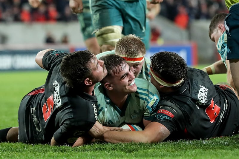 Munster's Alex Kendellen celebrates after scoring his team's third try 
against the Emirates Lions at Thomond Park. Photograph: Ben Brad/Inpho