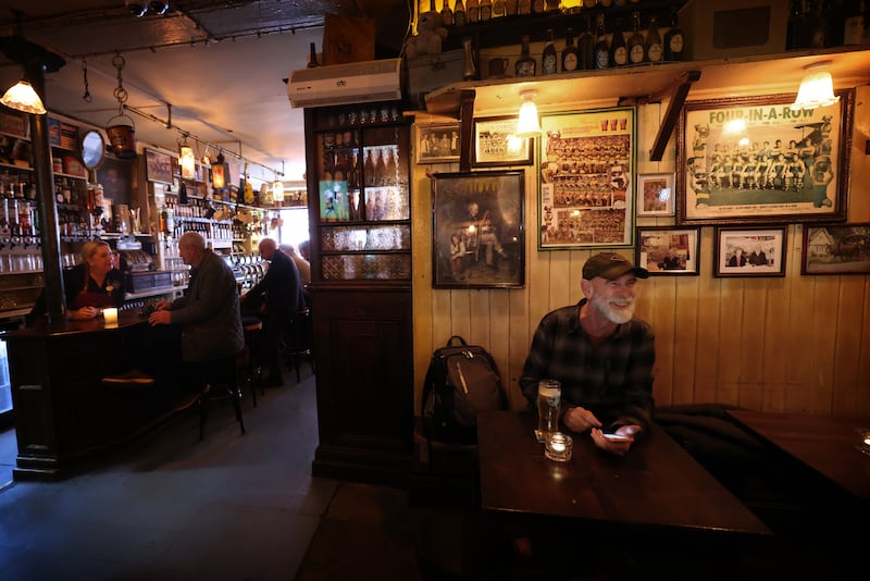 Vernon Cromwell, a visitor from Montana in the United States, enjoys a beer in JM Reidy's pub on Main Street, Killarney. Photogrph: Bryan O’Brien