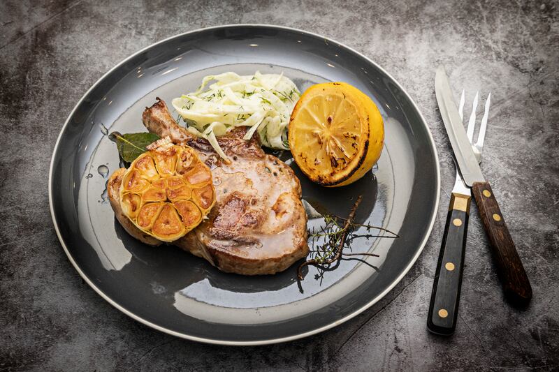 Pork chops, fennel, garlic and lemon. Photograph: Harry Weir