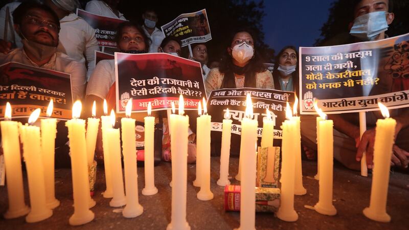 Indian Youth Congress activists hold a candle light vigil after the Dalit girl’s death in Delhi. Photograph: Rajat Gupta/EPA