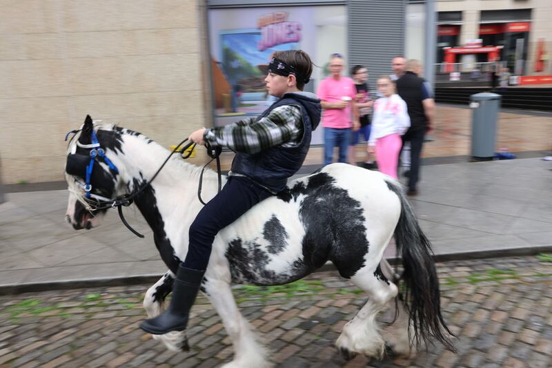 One man attending the Smithfield Horse Fair said: 'It keeps the wee fellas off the streets, and gives them a purpose.” Photograph: Dara Mac Dónaill
