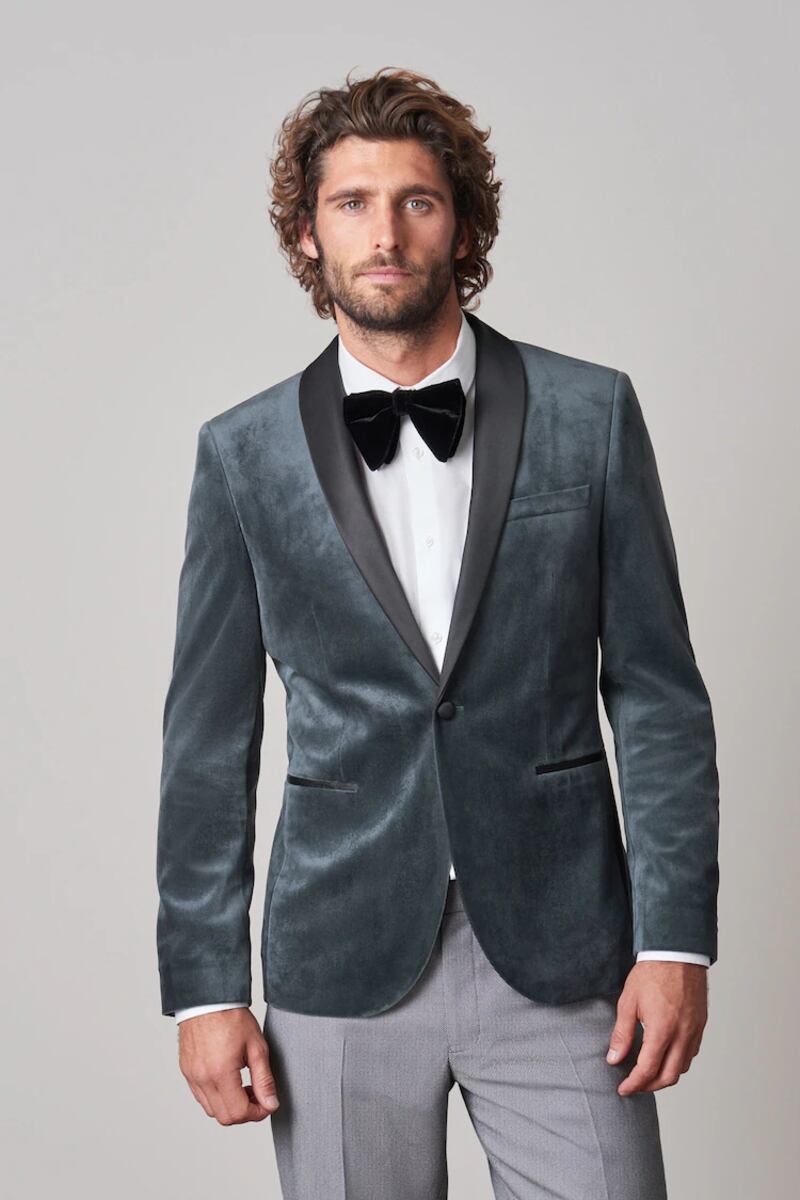 Grey velvet jacket, €112, grey trousers, €42, and velvet bow tie, €8.50, all at Next