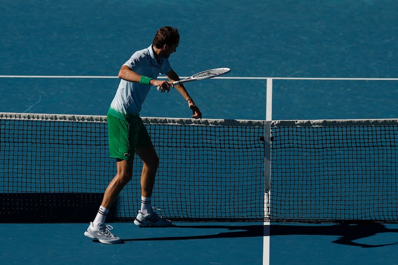 Daniil Medvedev smashes a tv net camera installed on the net with his racket as he has lost the third set against Kasidit Samrej of Thailand in Melbourne. Photograph: Daniel Pockett/Getty Images