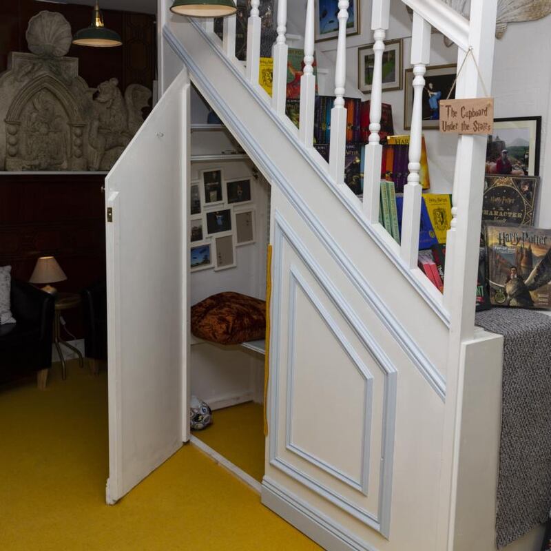 The Cupboard Under the Stairs replica, which Neil Paul built and equipped with original cushions from the Harry Potter set