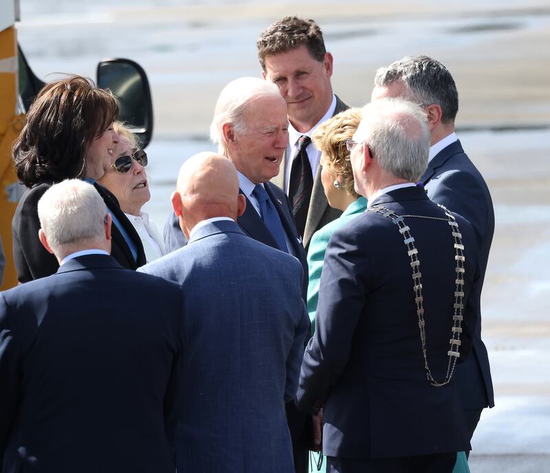 President Joe Biden is greeted by Geraldine Byrne Nason, Ambassador of Ireland to the United States, Minister for the Environment Eamon Ryan and Minister of State Dara Calleary. Photograph: Julien Behal