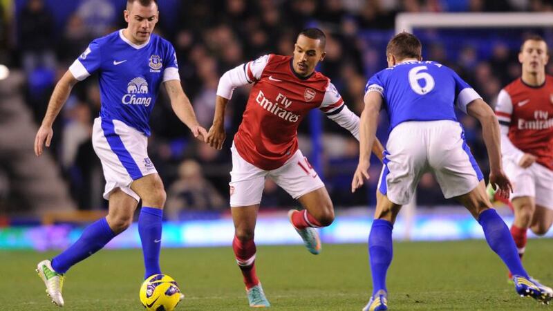 Theo Walcott of Arsenal takes on Darron Gibson and Phil Jagielka of Everton dur at Goodison Park last year.  Photograph: Stuart MacFarlane/Getty Images