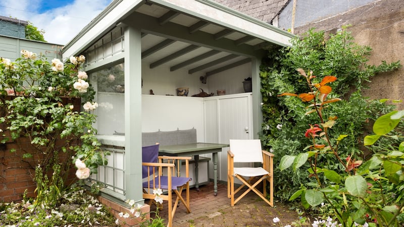 Pergola with an inbuilt seat.