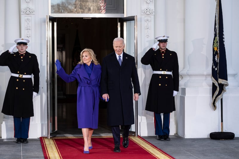 Joe Biden and Jill Biden outside the North Portico of the White House awaiting the arrival of Donald Trump and vice-president JD Vance for a traditional tea in Washington on Monday. Photograph: Pete Marovich/The New York Times
                      