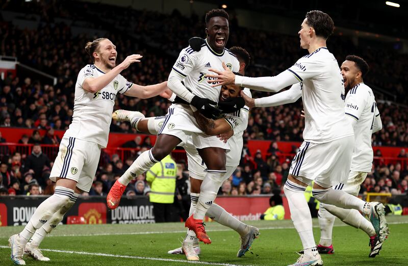 Leeds United's Wilfried Gnonto celebrates with Crysencio Summerville after Raphael Varane of Manchester United concedes an own goal. Photograph: Naomi Baker/Getty Images