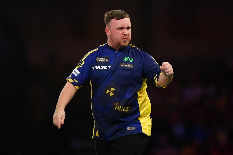 Luke Littler celebrates during his match against Ian White. Photograph: Zac Goodwin/PA