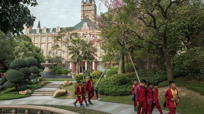 Students at the Evergrande Football School, in Qingyuan, Guangdong, China, in December, 2016. The real estate developer Evergrande once binged on debt but now the music has stopped. Photograph: Gilles Sabrie/The New York Times