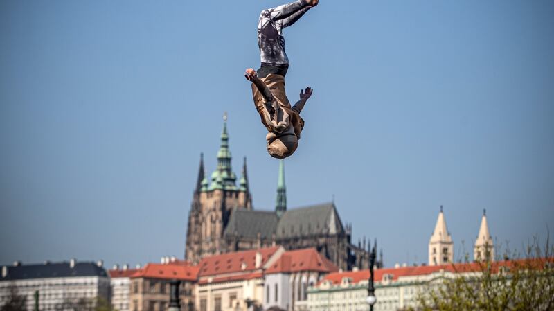 A member of the contemporary circus company Cirk La Putyka performs on a mobile trampoline in Prague, Czech Republic. Photograph: Martin Divisek/EPA