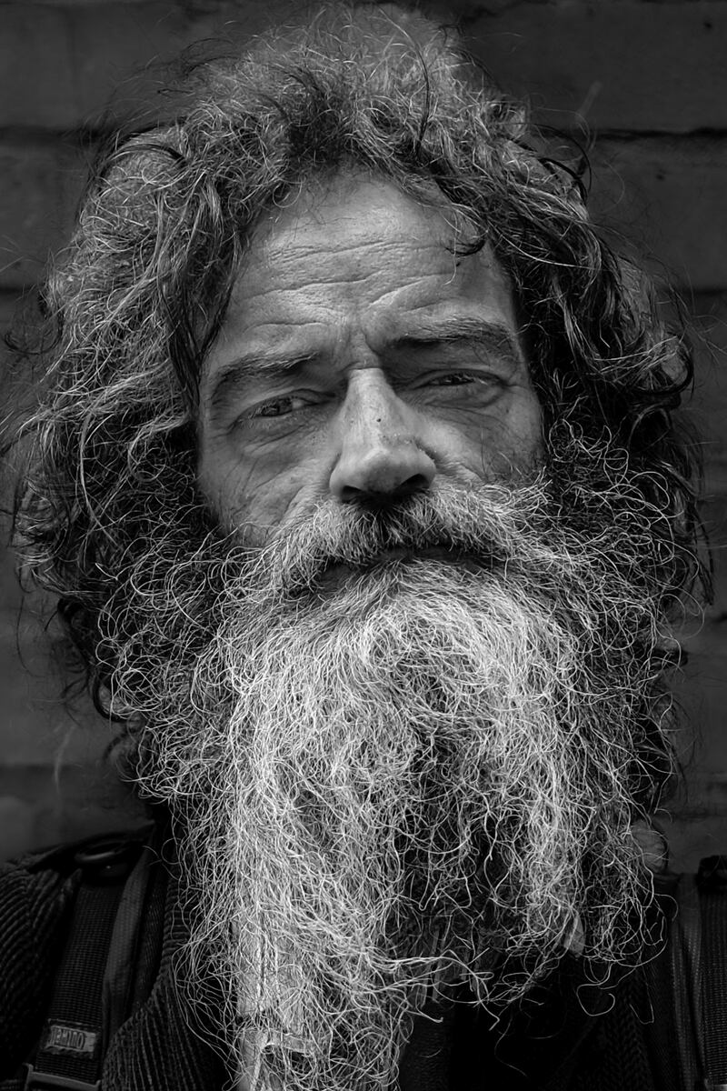 Garth, Liverpool Street, London. Garth studied fine art and carries his abstract drawings around with him when living on the street. This was the final photograph of the Outsiders project. Photograph: Marc Davenant