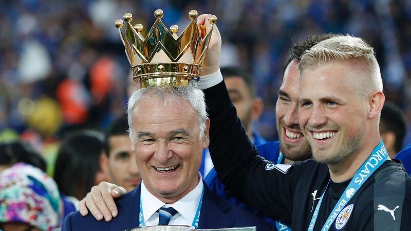 Leicester City manager Claudio Ranieri with Christian Fuchs and Kasper Schmeichel following their amazing Premier League success in 2016. Photograph: Adrian Dennis/AFP/Getty Images