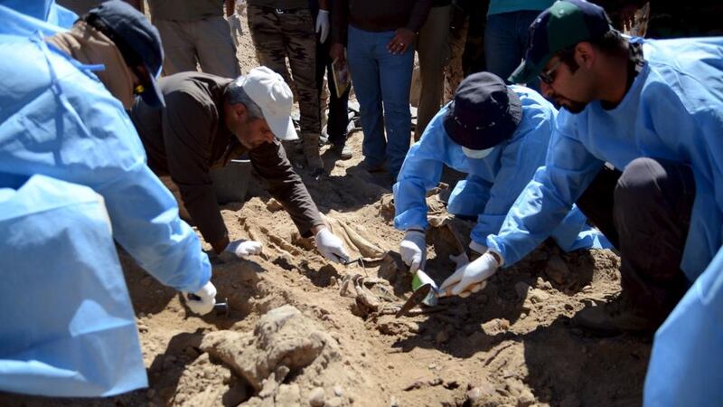 Iraqi forensic teams began on Monday excavating 12 suspected mass grave sites thought to hold the corpses of as many as 1,700 soldiers massacred last summer by Islamic State militants as they swept across northern Iraq. Photograph: Reuters/Stringer