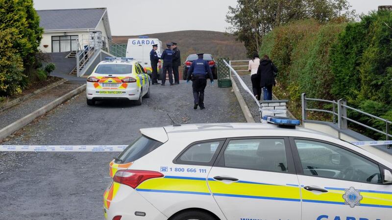 Gardaí outside the house in Carndonagh, Co Donegal where a couple in their 70s were found dead today. Photograph: Trevor McBride